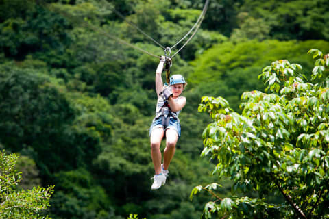 Young girl ziplining in Costa Rica