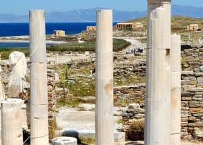 Ruins and remains of marble statues on the island of Delos, Greece